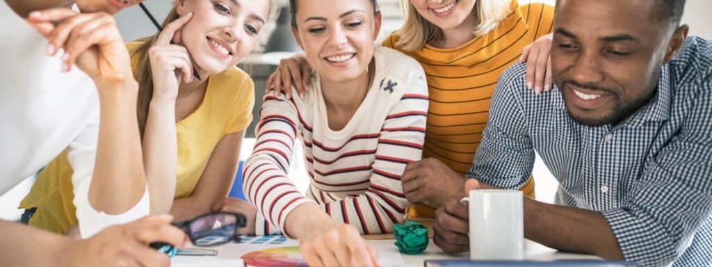 STUDIO FIVE - Increasing Website Engagement: Group collaborating around a table.