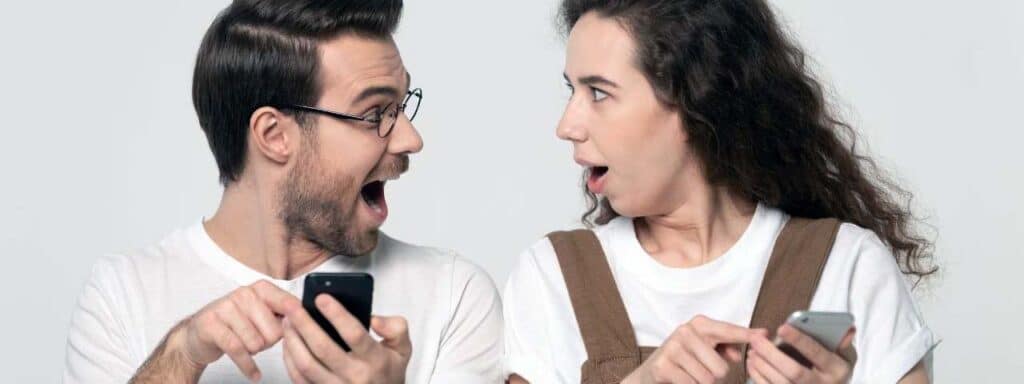 STUDIO FIVE - Increasing Website Engagement: Two people using smartphones together.