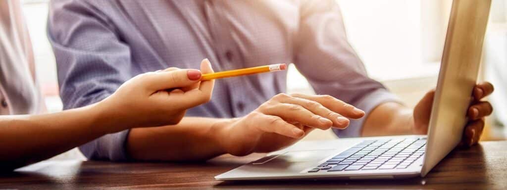 STUDIO FIVE - E-Commerce Spring Cleaning Tips: Hands interacting with a laptop